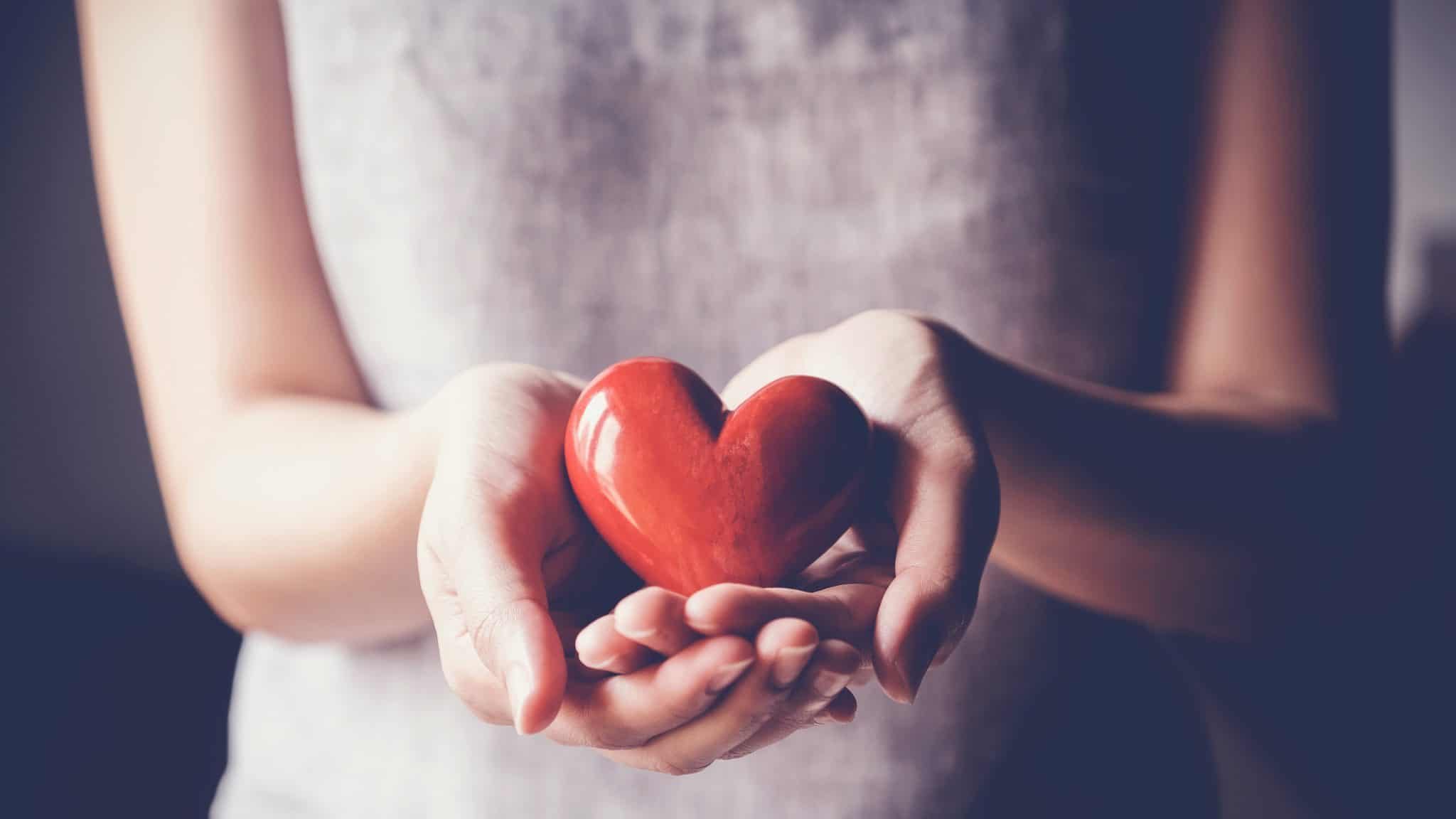 woman holding red heart, health insurance, donation charity concept, world health day, world mental health day, world heart day, foster care, gratitude, kind, thankful, hope, all lives matter, concept