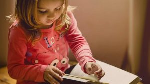 girl in pink sweatshirt